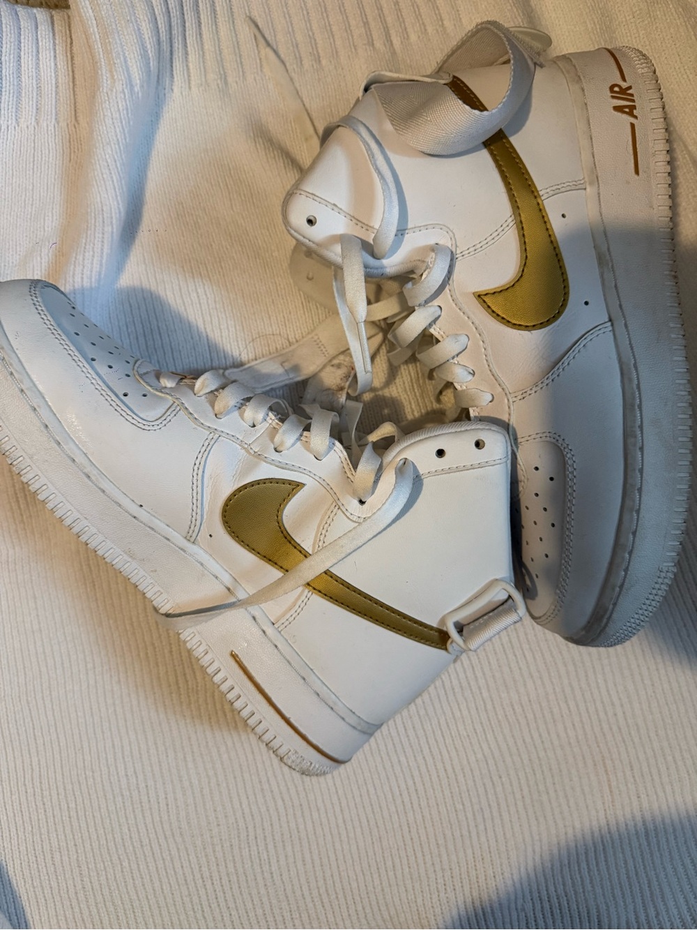Air Force  nike White High-Top Sneakers with Gold Swoosh Accent